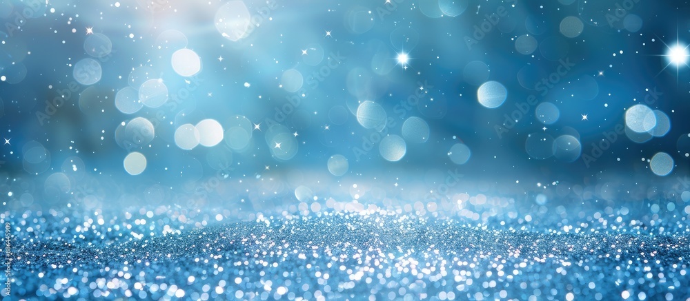 Leinwandbilder a sparkling blue background with glitter shining in the sunlight leaving space for text. with copy s