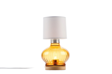 A Warm Amber Glass Table Lamp With a White Shade Illuminates a Cozy Corner on a White or Clear Surface PNG Transparent Background