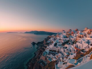 Fototapeta premium View of Santorini in Greece view from the top with a calm sea and white buildings.