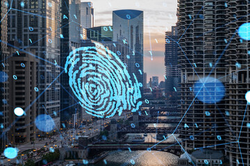 Overlooking a cityscape at dusk with a large fingerprint hologram interface, concept of urban security and technology. Double exposure