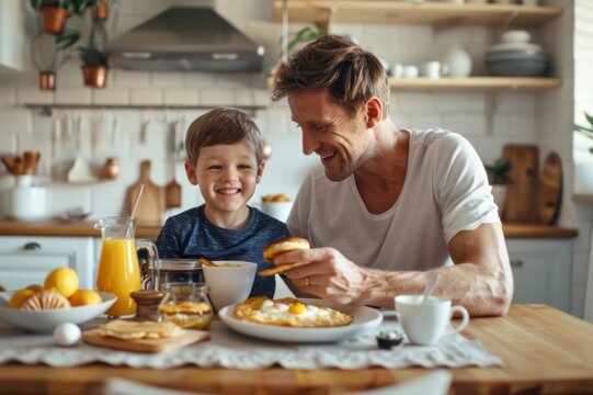 A happy father and son were having breakfast at home.