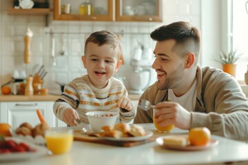 A happy father and son were having breakfast at home.