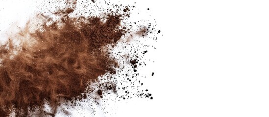 Colorful brown powder texture with abstract splatted patterns on a white background ideal for a copy space image