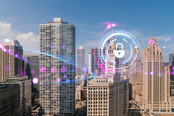 Chicago cityscape with futuristic hologram security concept overlay, on a clear day background. Double exposure