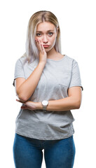 Young blonde woman over isolated background thinking looking tired and bored with depression problems with crossed arms.