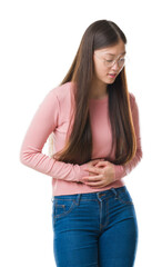 Fototapeta premium Young Chinese woman over isolated background wearing glasses with hand on stomach because indigestion, painful illness feeling unwell. Ache concept.