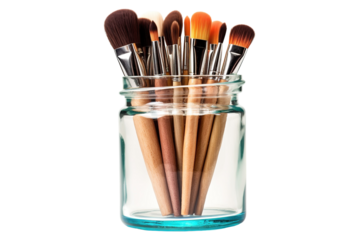 A Colorful Collection of Brushes in a Glass Jar on a White or Clear Surface PNG Transparent Background