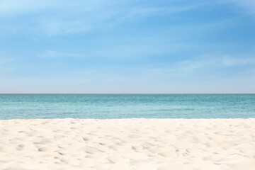 Beautiful sandy beach and sea on sunny day. Summer vacation