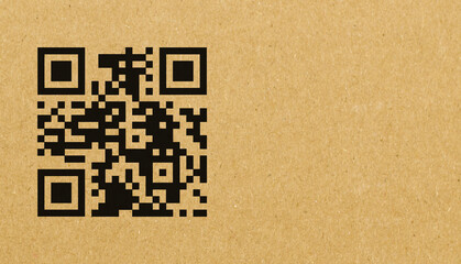 QR code sample for smartphone scanning isolated on cardboard background