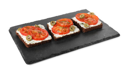 Delicious ricotta bruschettas with sliced tomatoes, olives and greens isolated on white