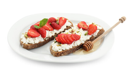 Delicious ricotta bruschettas with strawberry, mint and pistachios served with honey isolated on white