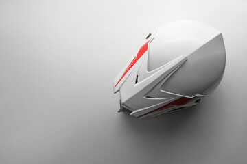 Stylish motorcycle helmet on white background, top view. Space for text