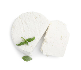 Fresh ricotta (cream cheese) and basil isolated on white, top view