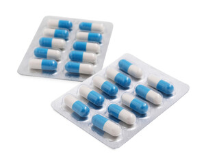 Antibiotic pills in blisters isolated on white