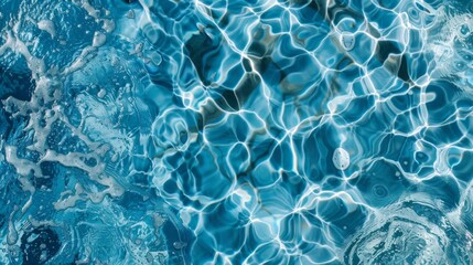 Fototapeta premium Top view blue water caustics background. Clear ripples pool water texture. Summer vacation