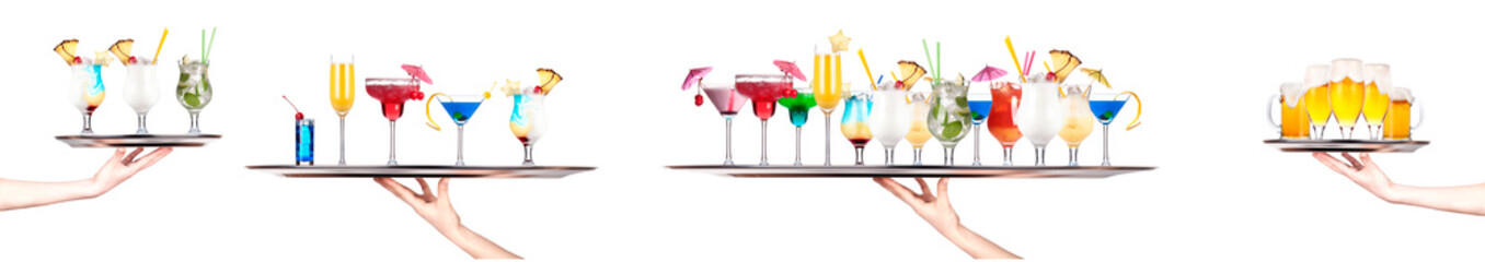 Hand holding tray with different alcohol cocktails isolated on white background