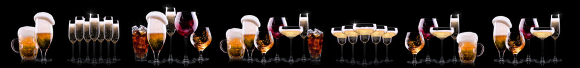 Hand holding tray with different alcohol cocktails isolated on black background