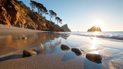 A beautiful sunrise casts a warm glow over a serene pebble beach, with tranquil waves quietly lapping against the shore, creating a peaceful and calming scene.