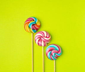 Color lollipop, spiral candy on stick, colorful striped lollypop, round fruit caramel, circle lollipop