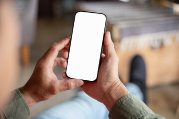 cell phone blank white screen mockup.hand holding texting using mobile on desk at office.background empty space for advertise.work people contact marketing business,technology