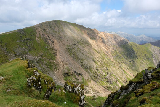 The arete ridge of Garnedd Ugain and Crib Goch, in the Snowdonia mountain range, North Wales.