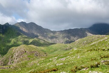 Looking towards the peaks of  Lliwedd Bach and Y Lliwedd from the Miners’ Track, in the Snowdonia mountain range, North Wales.