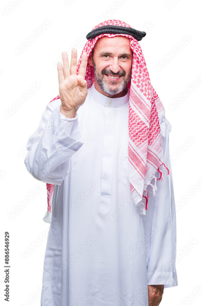 Canvas Prints Senior arab man wearing keffiyeh over isolated background showing and pointing up with fingers number four while smiling confident and happy.