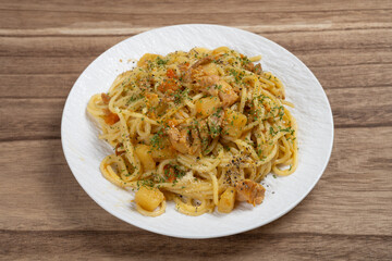 angle view spaghetti with chicken and potato curry sauce