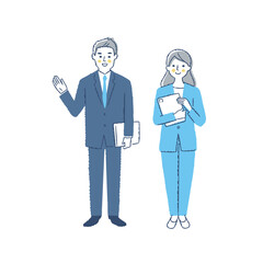 笑顔で立っているビジネスパーソンの男女