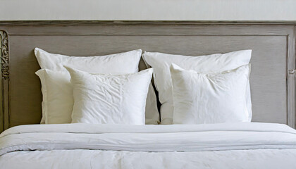 White bedding sheets and pillow background, Messy bed concept