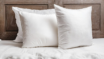 White pillow on bed in bedroom closeup