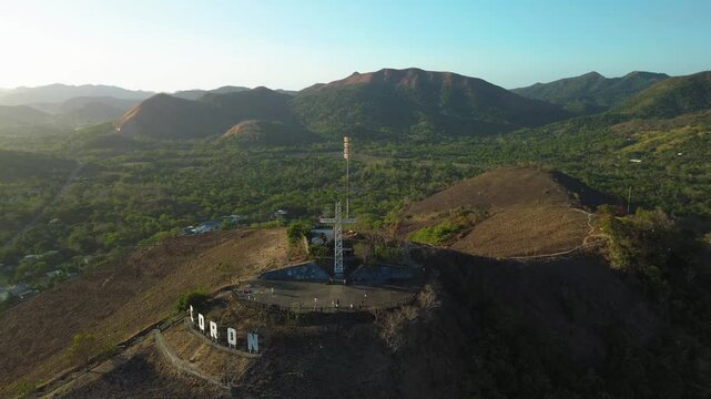 Aerial view of Mount Tapyas cross and Coron sign in Palawan Philippines
