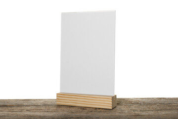 Menu holder on wooden table against white background. Mockup for design