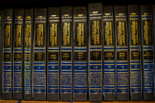 The collection of Talmud books, a Jewish records which is holy in Judaism religion, on the shelf in synagogue.
