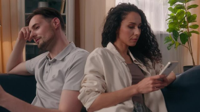 Gadget addicted family smartphones addict problem overuse internet social media dependence addiction couple separate ignoring Caucasian man guy male Hispanic woman girl female home using mobile phones