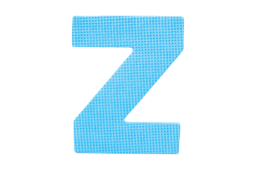 ฺJigsaw foam plastic blue English uppercase "Z" alphabet isolated on cut out PNG or transparent background. Character. Colorful foam alphabet puzzle pieces used in learning education for children.	