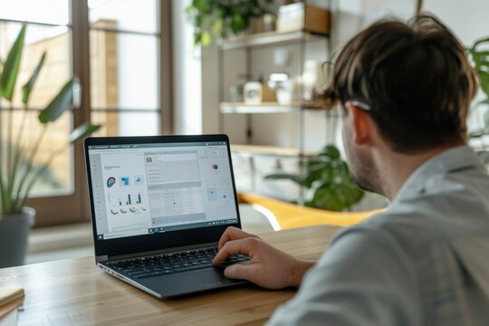 Remote Employee Engaging in Technical Skill Training on Laptop with Detailed Instructions and Feedback