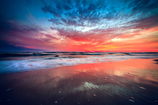 Dramatic sunset over Baltic sea beach, Lithuania