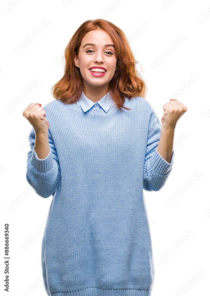 Sticker young beautiful woman over isolated background wearing winter sweater celebrating surprised and amaz