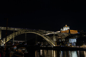 Dom Luis I bridge at night in Porto, Portugal