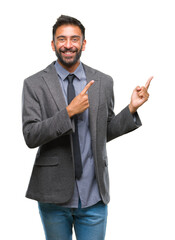 Adult hispanic business man over isolated background smiling and looking at the camera pointing with two hands and fingers to the side.
