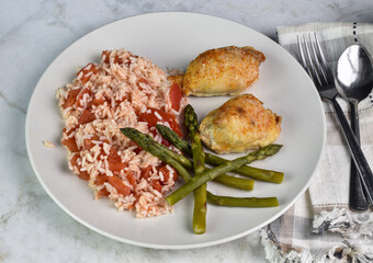 seasoned chicken breast  with asparagus and rice
