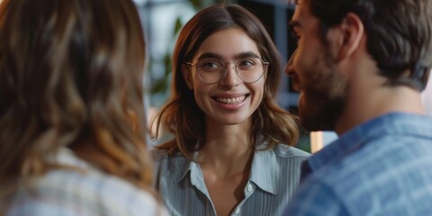 Fototapeta premium A woman wearing glasses talks to a man in a quiet setting