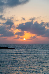 Sunset over the Mediterranean Sea at Caesarea National Park in Israel.
