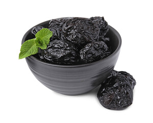 Tasty dried plums (prunes) and mint leaves in bowl on white background