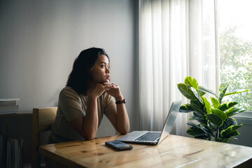 Confused concerned young woman getting problems with mobile phone while working at home, feeling stressed, frustrated - Powered by Adobe