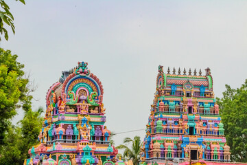Colorful Hindu temple tower. Panduranga Perumal temple, Picture clicked at Thenangur village in Tamil Nadu, south India, India.