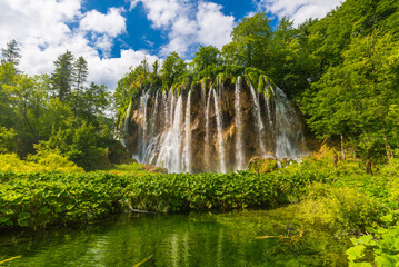 Magnificent round waterfall with many streams.  Plitvice Lakes