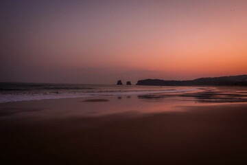 Sunrise on the beach of the two twins in Hendaye