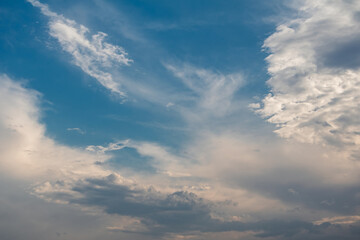 Fototapeta premium A blue sky with fluffy white clouds after the rain